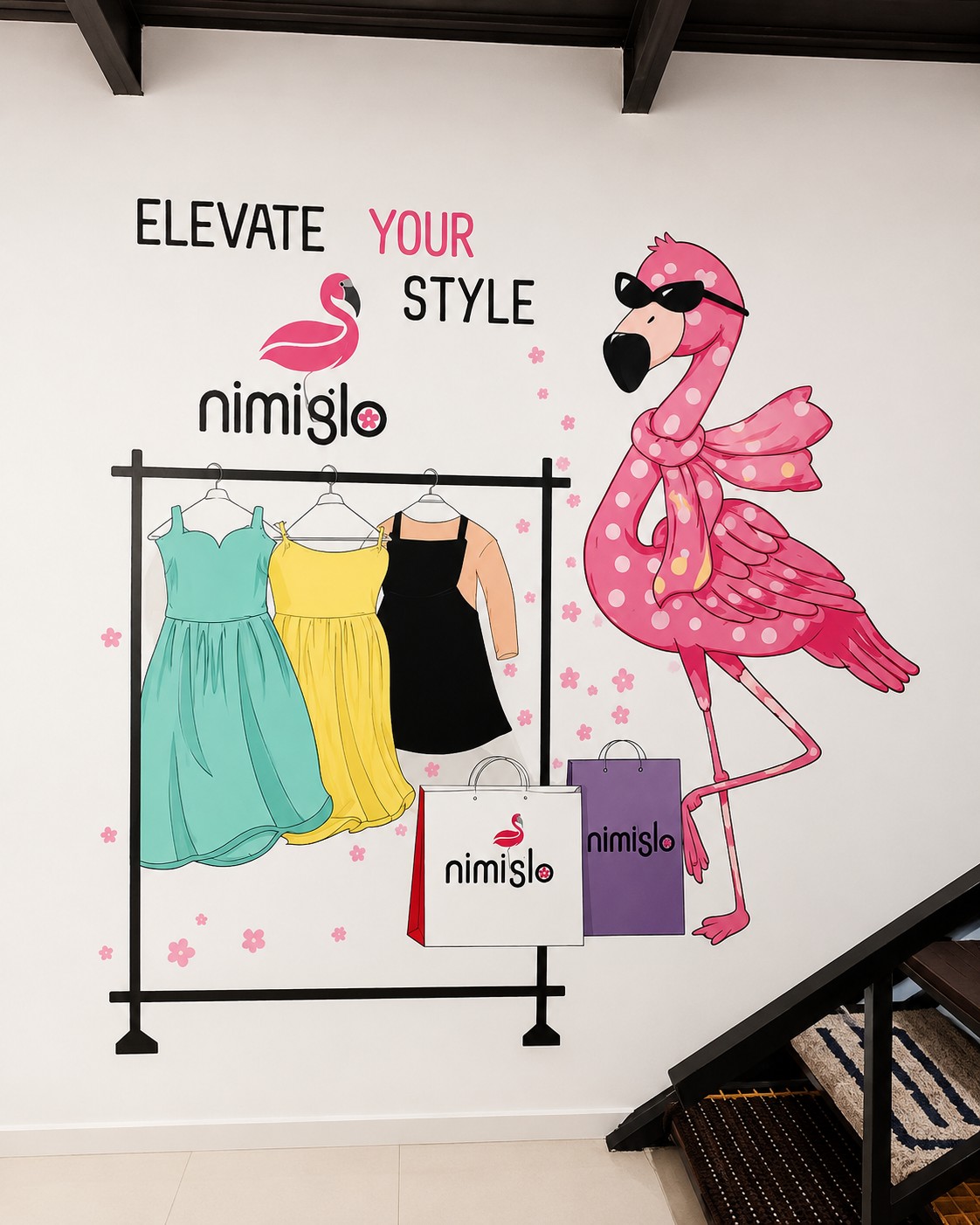 Stylish mural with a pink flamingo and fashion elements